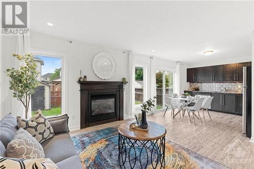 826 Clearbrook Drive, Ottawa, ON - Indoor Photo Showing Living Room With Fireplace