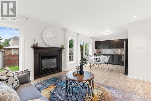 826 Clearbrook Drive, Ottawa, ON - Indoor Photo Showing Living Room With Fireplace