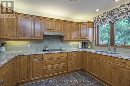 10364 Pinetree Drive, Lambton Shores (Grand Bend), ON - Indoor Photo Showing Kitchen With Double Sink