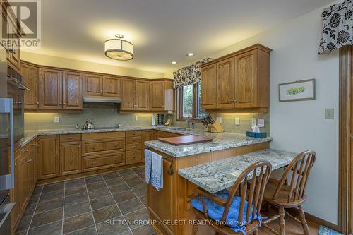 10364 Pinetree Drive, Lambton Shores (Grand Bend), ON - Indoor Photo Showing Kitchen With Double Sink