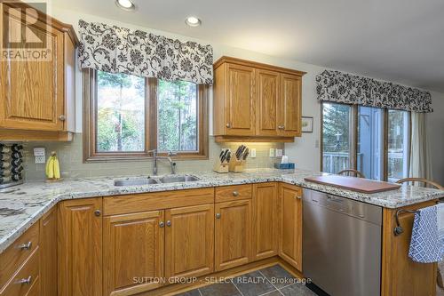 10364 Pinetree Drive, Lambton Shores (Grand Bend), ON - Indoor Photo Showing Kitchen With Double Sink