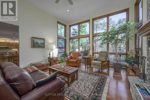 10364 Pinetree Drive, Lambton Shores (Grand Bend), ON - Indoor Photo Showing Living Room With Fireplace