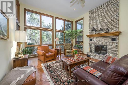 10364 Pinetree Drive, Lambton Shores (Grand Bend), ON - Indoor Photo Showing Living Room With Fireplace