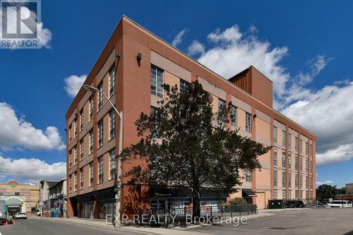 204 - 11 Rebecca Street, Hamilton, ON - Outdoor With Facade