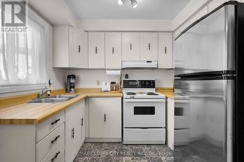 119 - 320 Westminster Avenue, London, ON - Indoor Photo Showing Kitchen With Double Sink