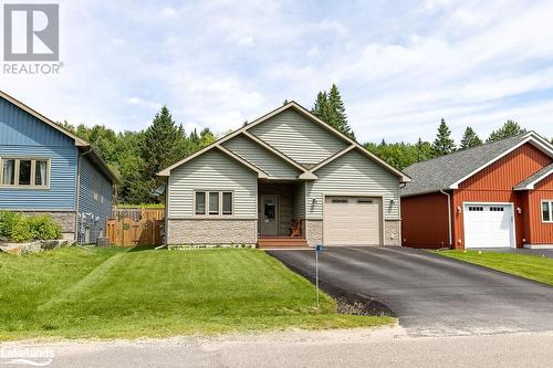 86 Chaffey Township Road, Huntsville, ON - Outdoor With Facade