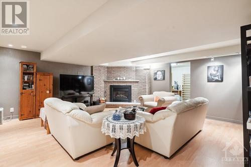 37 Revol Road, Ottawa, ON - Indoor Photo Showing Living Room With Fireplace