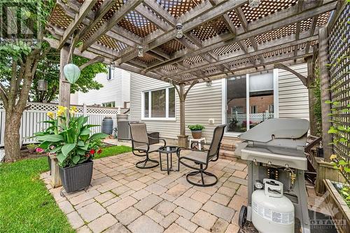 Backyard Interlock Patio and Pergola - 7 Vermont Avenue, Ottawa, ON - Outdoor With Deck Patio Veranda