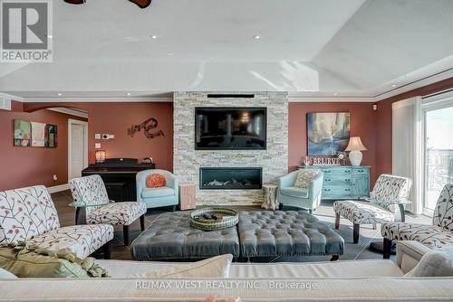 31 Wispi Shore Road, Kawartha Lakes, ON - Indoor Photo Showing Living Room With Fireplace