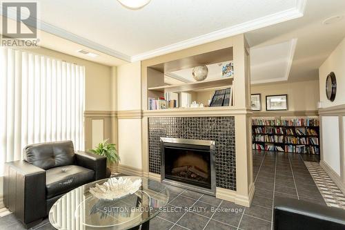 library - 1008 - 1030 Coronation Drive, London, ON - Indoor Photo Showing Living Room With Fireplace