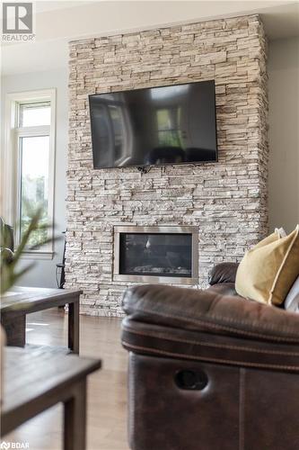 132 Cherrywood Parkway, Napanee, ON - Indoor Photo Showing Living Room With Fireplace