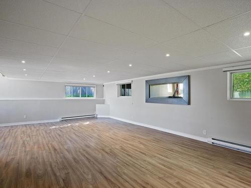 Salle familiale - 395 60E Avenue, Pointe-Calumet, QC - Indoor Photo Showing Other Room