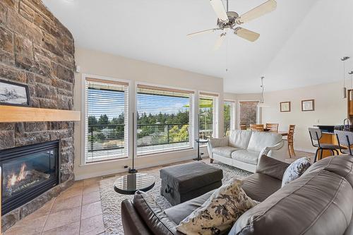 2243 Shannon Hills Place, Kelowna, BC - Indoor Photo Showing Living Room With Fireplace