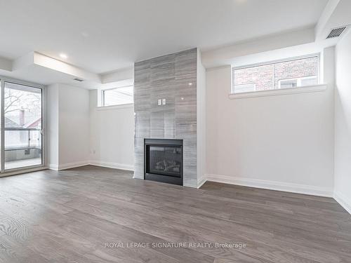 202-285 Avenue Rd, Toronto, ON - Indoor Photo Showing Other Room With Fireplace