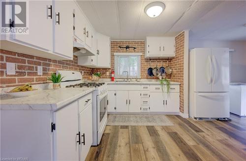 806201 County 29 Road Unit# 44, Innerkip, ON - Indoor Photo Showing Kitchen With Double Sink