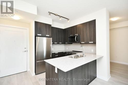 2915 - 35 Watergarden Drive, Mississauga (Hurontario), ON - Indoor Photo Showing Kitchen With Double Sink With Upgraded Kitchen