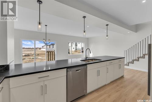 106 Prasad Union, Saskatoon, SK - Indoor Photo Showing Kitchen With Double Sink