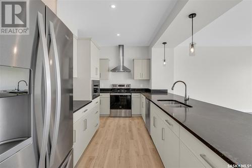 106 Prasad Union, Saskatoon, SK - Indoor Photo Showing Kitchen With Double Sink With Upgraded Kitchen