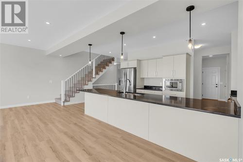 106 Prasad Union, Saskatoon, SK - Indoor Photo Showing Kitchen With Upgraded Kitchen