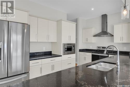 106 Prasad Union, Saskatoon, SK - Indoor Photo Showing Kitchen With Double Sink With Upgraded Kitchen