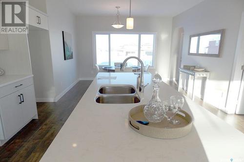 115 Taube Avenue, Saskatoon, SK - Indoor Photo Showing Kitchen With Double Sink