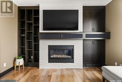 151 Centennial Drive, Grand Coulee, SK - Indoor Photo Showing Living Room With Fireplace