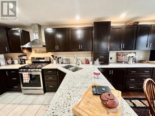 916 Scott Road, 100 Mile House, BC - Indoor Photo Showing Kitchen With Double Sink With Upgraded Kitchen