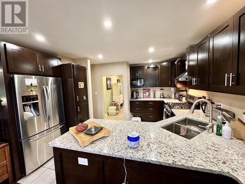 916 Scott Road, 100 Mile House, BC - Indoor Photo Showing Kitchen With Double Sink With Upgraded Kitchen