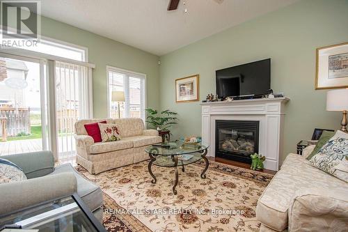 20 Deacon Crescent, Kawartha Lakes (Lindsay), ON - Indoor Photo Showing Living Room With Fireplace