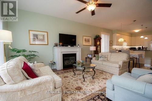 20 Deacon Crescent, Kawartha Lakes (Lindsay), ON - Indoor Photo Showing Living Room With Fireplace