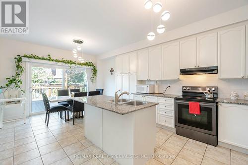 48 Monabelle Crescent, Brampton (Vales Of Castlemore North), ON - Indoor Photo Showing Kitchen With Double Sink