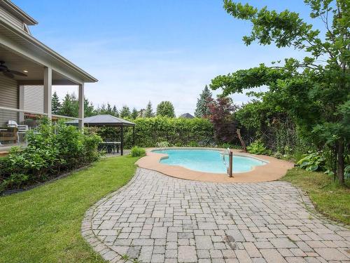 Backyard - 2631 Rue Principale, Sainte-Julie, QC - Outdoor With In Ground Pool With Backyard