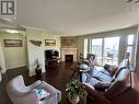 2125 Atkinson Street Unit# 903, Penticton, BC  - Indoor Photo Showing Living Room With Fireplace 