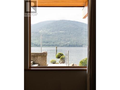 5940  3A Highway, Nelson, BC - Indoor Photo Showing Other Room With Body Of Water