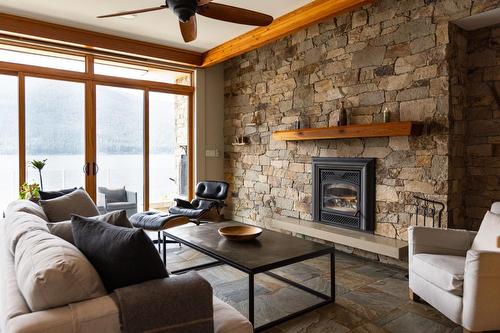 5940 Highway 3A, Nelson, BC - Indoor Photo Showing Living Room With Fireplace