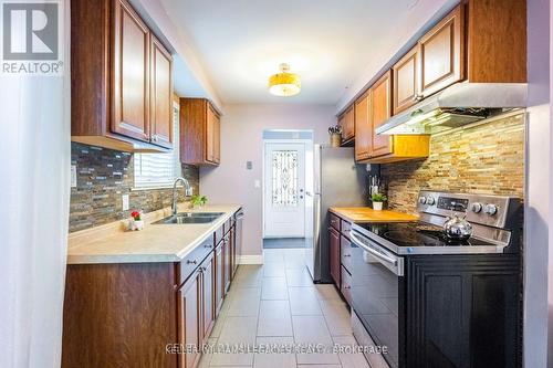 42 Adeline Avenue, New Tecumseth, ON - Indoor Photo Showing Kitchen With Double Sink