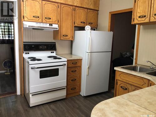 454 2Nd Avenue Ne, Preeceville, SK - Indoor Photo Showing Kitchen With Double Sink