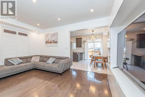 99 Huguenot Road, Oakville, ON - Indoor Photo Showing Living Room With Fireplace