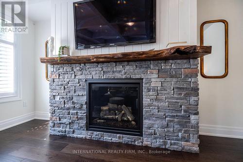 82 Hennessey Crescent, Kawartha Lakes, ON - Indoor Photo Showing Living Room With Fireplace