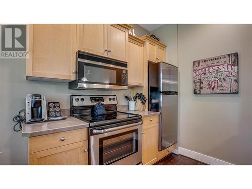 251 Predator Ridge Drive Unit# 36, Vernon, BC - Indoor Photo Showing Kitchen With Stainless Steel Kitchen