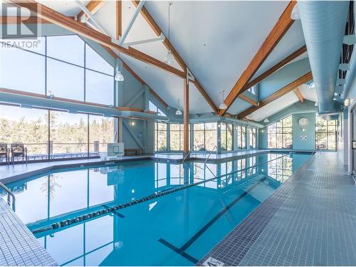 251 Predator Ridge Drive Unit# 36, Vernon, BC - Indoor Photo Showing Other Room With In Ground Pool