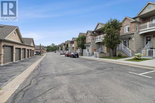 9 - 520 Silken Laumann Drive W, Newmarket, ON - Outdoor With Balcony With Facade