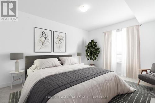 302 - 6 Spice Way, Barrie (Innis-Shore), ON - Indoor Photo Showing Bedroom