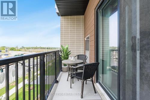 302 - 6 Spice Way, Barrie (Innis-Shore), ON - Outdoor With Balcony With Exterior