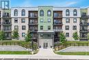 302 - 6 Spice Way, Barrie (Innis-Shore), ON  - Outdoor With Balcony With Facade 