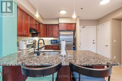 212 - 70 Baycliffe Crescent, Brampton, ON - Indoor Photo Showing Kitchen With Double Sink With Upgraded Kitchen