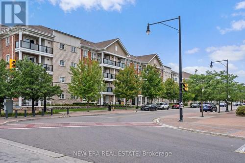 212 - 70 Baycliffe Crescent, Brampton (Northwest Brampton), ON - Outdoor With Balcony With Facade