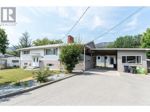 158 -160 Cariboo Road, Kelowna, BC - Outdoor With Facade