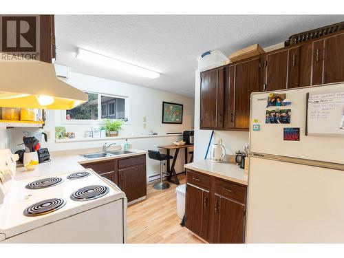 158 -160 Cariboo Road, Kelowna, BC - Indoor Photo Showing Kitchen With Double Sink