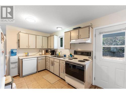 158 -160 Cariboo Road, Kelowna, BC - Indoor Photo Showing Kitchen With Double Sink